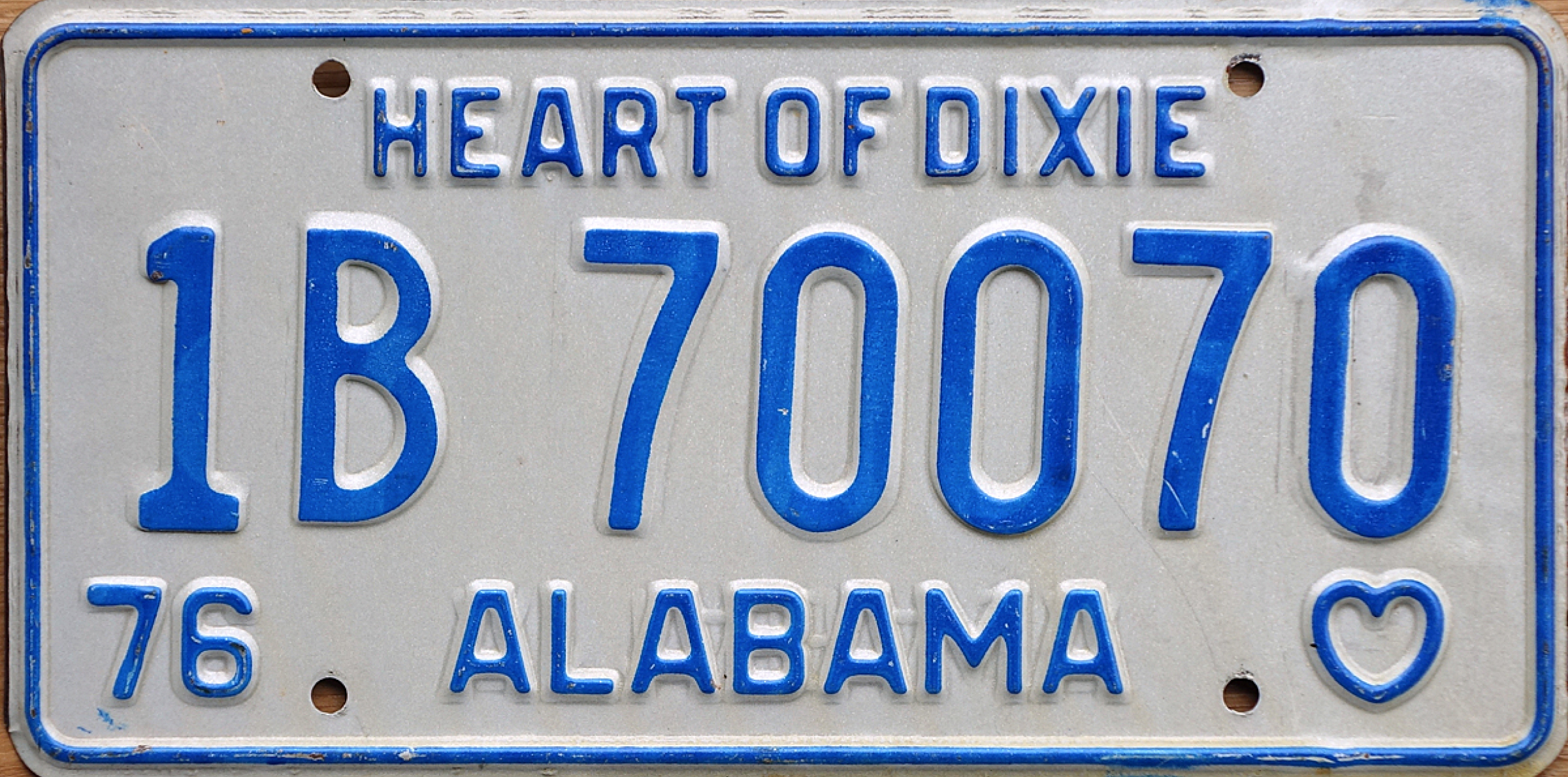 A 1976 Alabama license plate with the number 1B-70070
